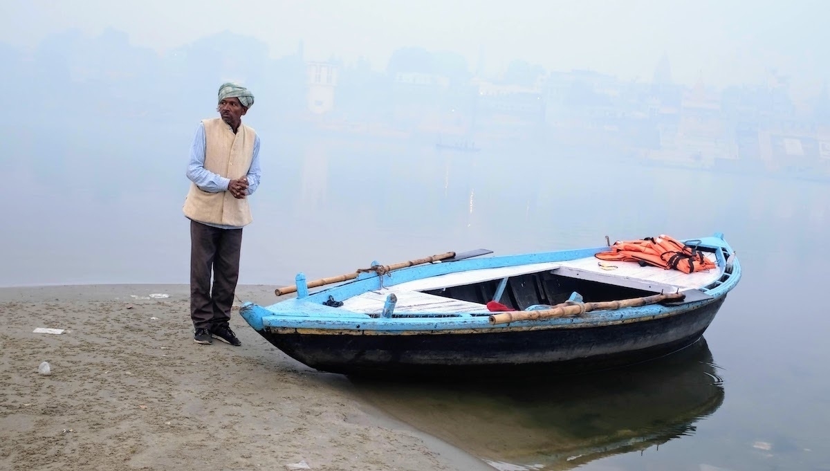 Boat rider in an early morning ride